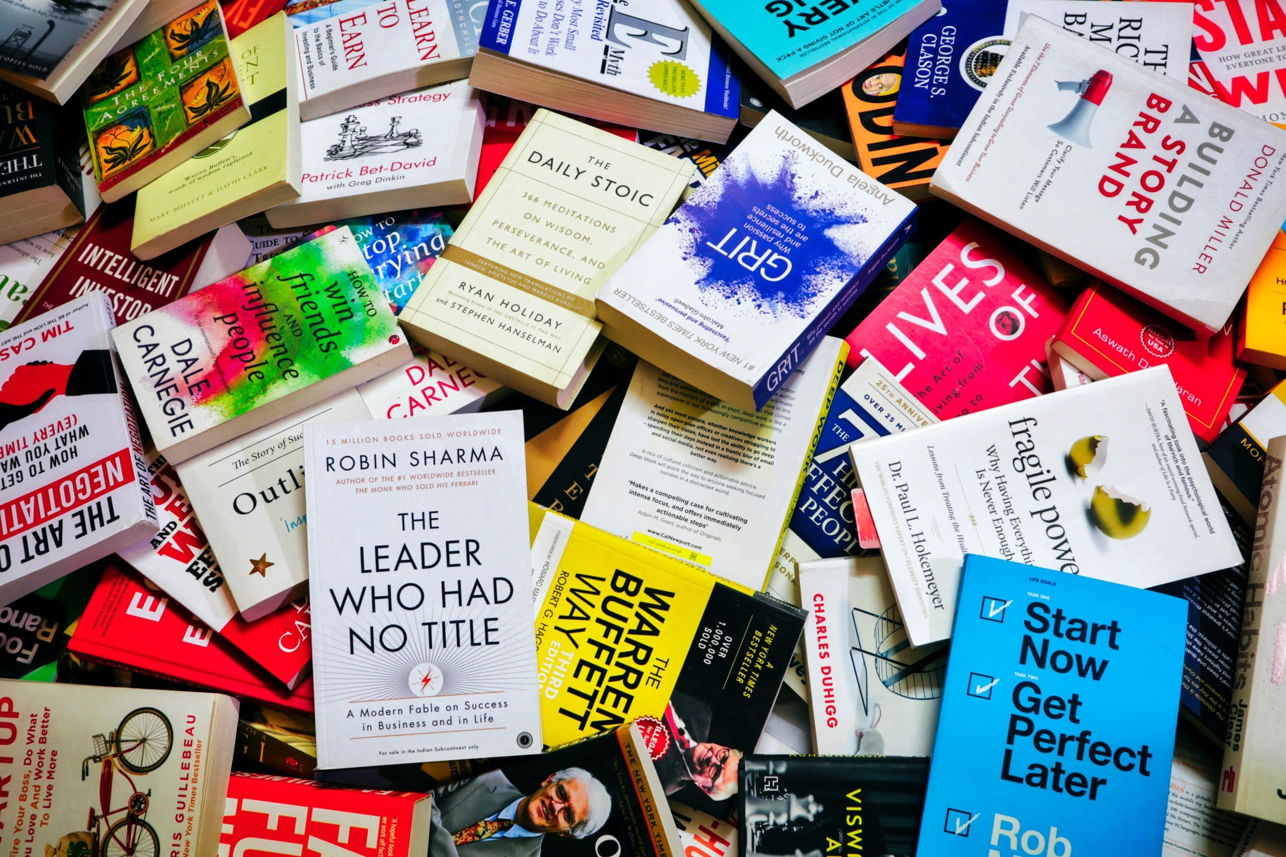 Hundreds of books in a pile