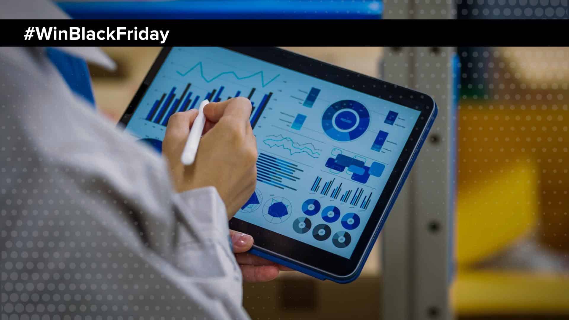 man looking at reports and inventory on an ipad